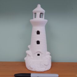 Lighted Lighthouse With Wave