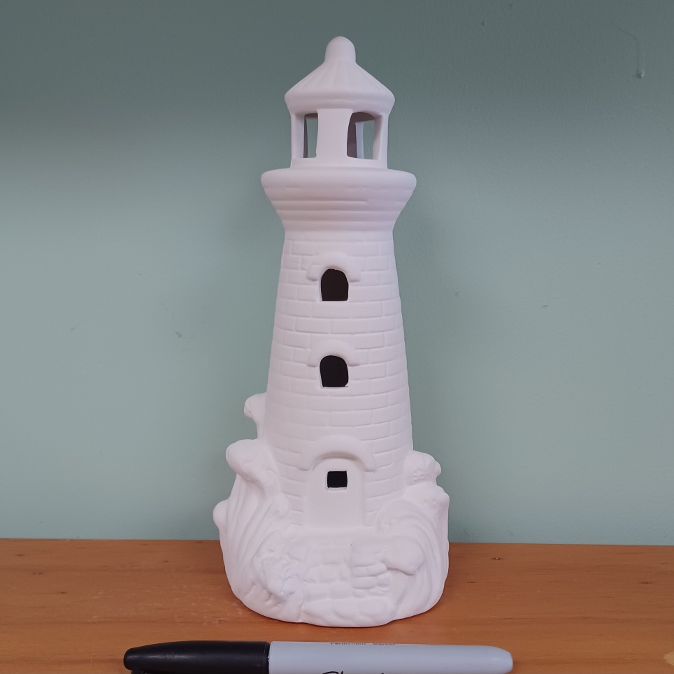 Lighted Lighthouse With Wave